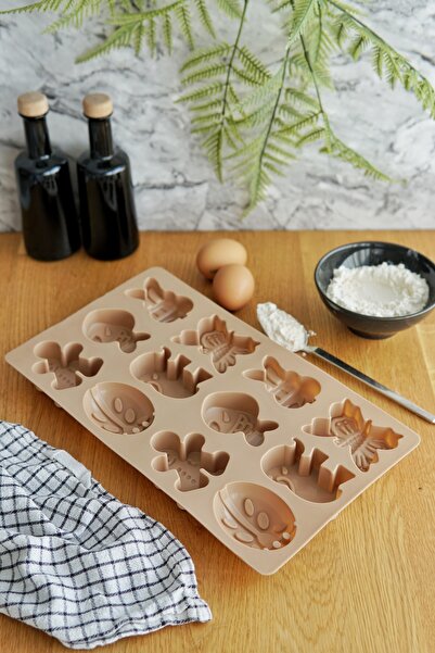 EVLE 12-Piece Cheerful Cookie Mold, Platinum Silicone, Light Brown