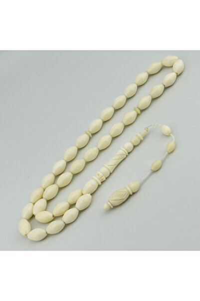 Tasarım قلم منحوت مصنوع من عظمة الجمل