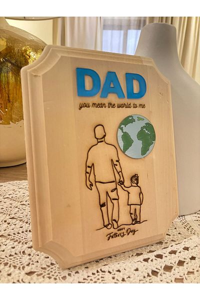 Reventon Engraved elegant wood piece with cutouts of world map and DAD ward