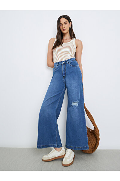 Styli بنطال جينز واسع الساق وخصر مرتفع مع نقشة باهتة