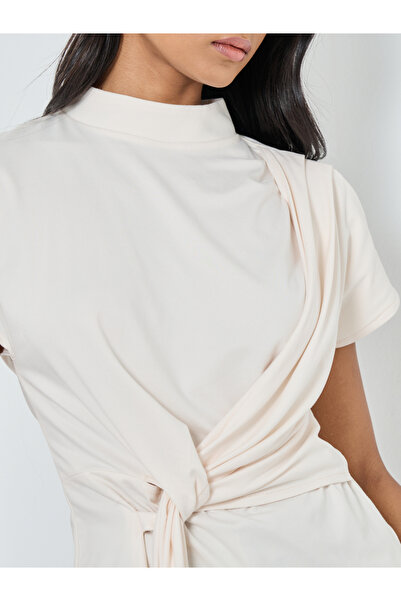 Styli Solid High Neck Knitted Top with Tie Detail