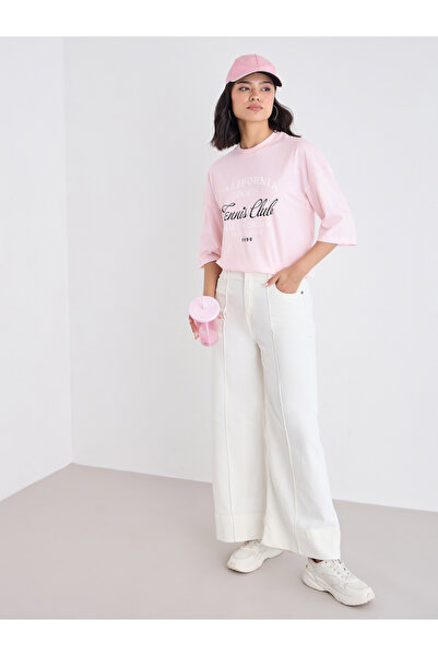 Styli Women Pink Slogan Print Dropped Shoulder Oversized T-Shirt