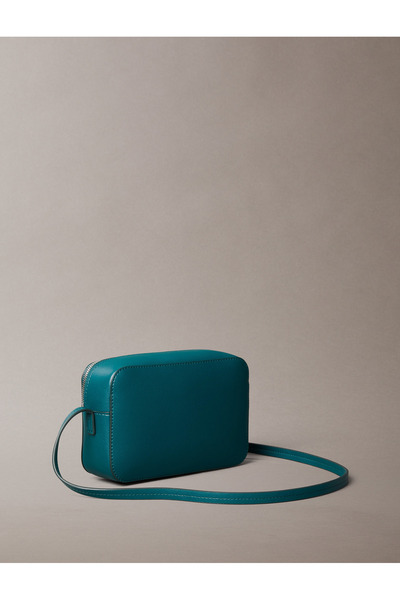 Calvin Klein Women Maya Blue/Dark Sky Turquoise Foil Logo Elongated Camera Bag
