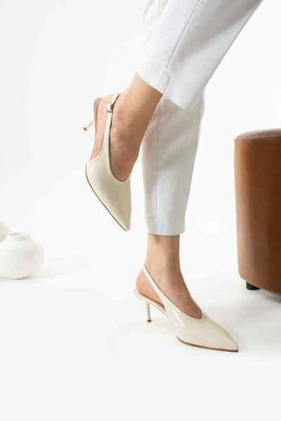 TubiBella Cream Colored Patent Leather Stiletto
