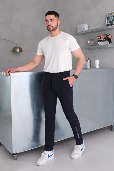 Behind Look Ανδρικό παντελόνι με κορδόνια στη μέση, λεπτή εφαρμογή, με τσέπες, ίσιο πόδι, εμπριμέ, μπλε ναυτικό