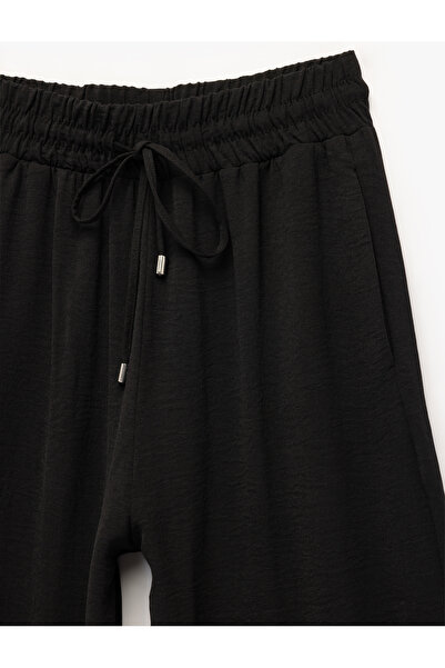 Koton Aerobin Kumaş Beli Bağcıklı Cepli Geniş Paça Palazzo Pantolon