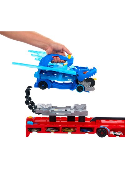 HOT WHEELS ® Giant Transporter Truck and 2 Toy Cars in 1:64 Scale
