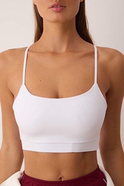 Trendyol Collection Sutien sport tricotat cu spate alb cu fereastră/detaliu decupat/suport cu bretele THMSS25SS00010