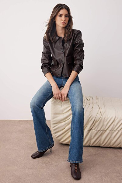 Trendyol Collection Вінтажні джинси кльош з високою талією синього кольору з ефектом вицвітання TWOAW25JE00169