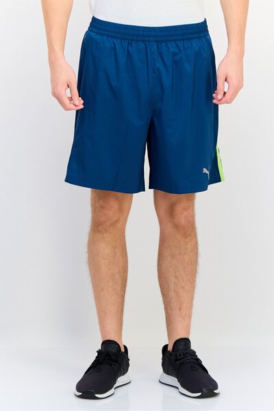 Puma Men Sportswear Fit 7 Inseam Brand Logo Running Shorts, Teal Blue