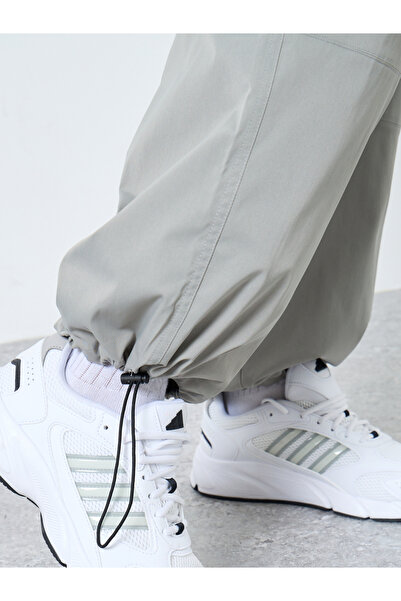 Styli Men Baggy Panelled Open Hem Parachute Pants