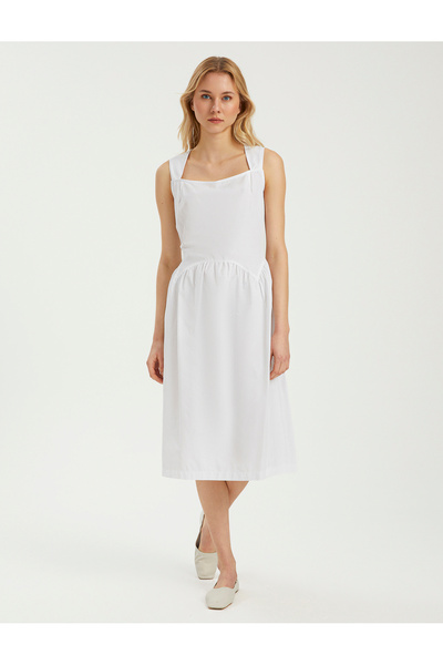 BGN workshop KARE YAKA ARKADAN BAĞCIK DETAYLI MİDİ KOTON ELBİSE