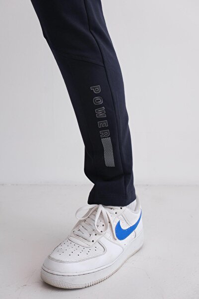 Behind Look Ανδρικό παντελόνι με κορδόνια στη μέση, λεπτή εφαρμογή, με τσέπες, ίσιο πόδι, εμπριμέ, μπλε ναυτικό