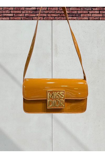 Generic MIssDior Flap bag fuchsia calfskin small shoulder bag Tan color.
