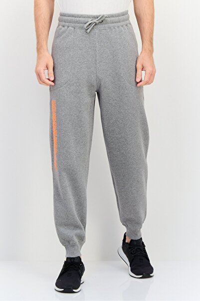 Calvin Klein بنطلون جينز رجالي بقصّة عادية، لون رمادي فاتح