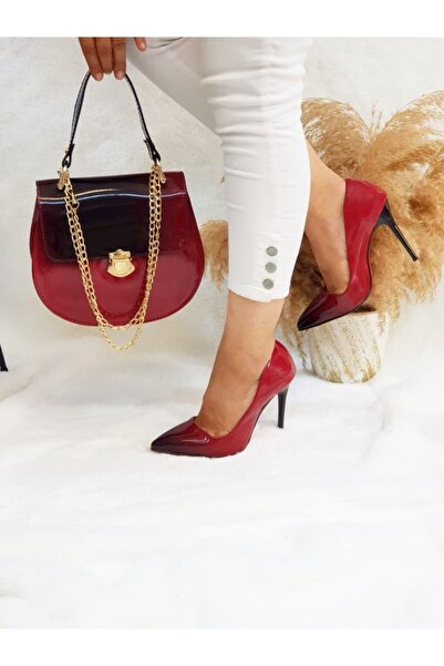 Leyla Yıldız بدلة نسائية حمراء بتفاصيل دخان