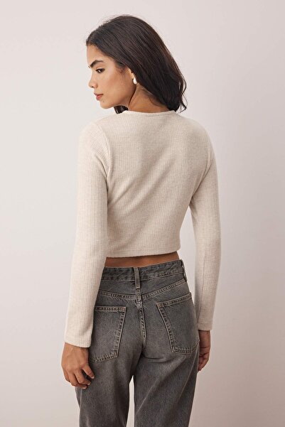 Trendyol Collection Μπλούζα με κουμπιά σε μπεζ χρώμα, κανονική εφαρμογή, με λεπτομέρεια με βούρτσα, ελαστική πλεκτή μπλούζα TWOAW26BZ00113
