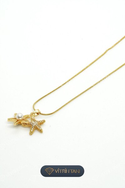 Çelik İnci ve Taş Detaylı Deniz Yıldızı Figürlü Altın Renk Kolye