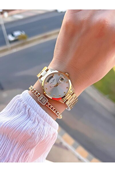 Tom Jones ساعة يد نسائية مقاومة للماء باللون الذهبي والتقويم وسوار فولاذي مقاوم للون 30 متر