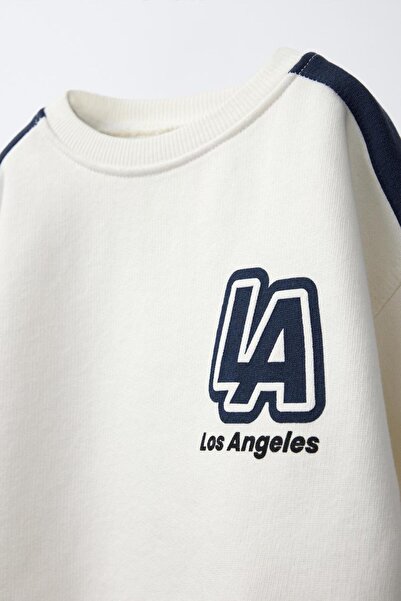 Magu Fiú pamut fehér LA nyomott mintás pulóver és melegítőnadrág szett