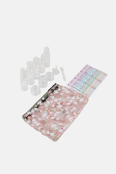 NANETTE LEPORE 12Pcs Travel Bottle Set With Pouch And Sticker Set, Multicolor
