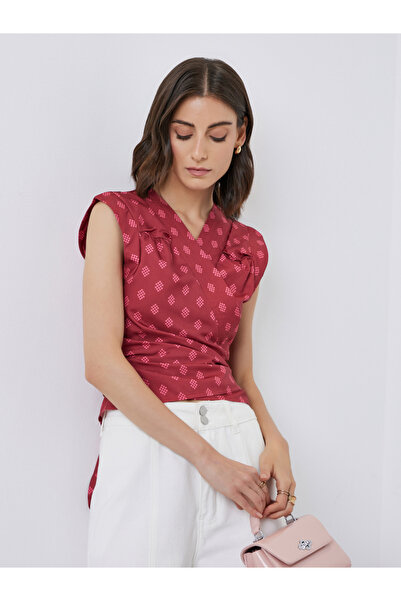 Styli بلوزة ملفوفة مطبوعة بدون أكمام