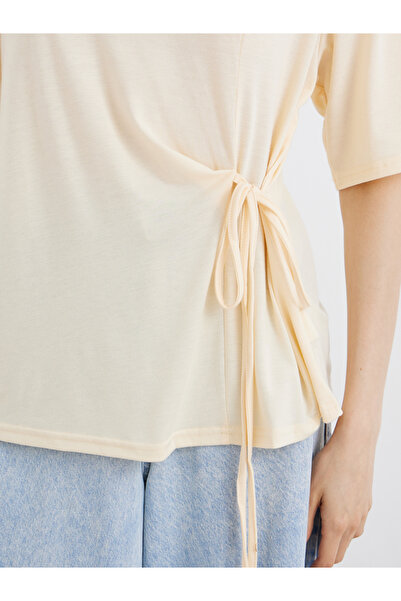 Styli Solid Round Neck Tie Up Detail Wrap Top