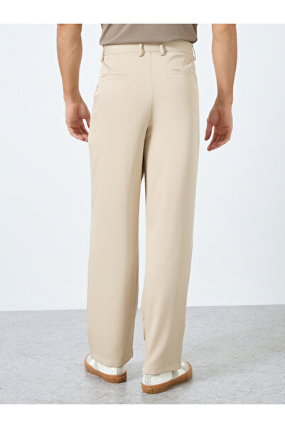 Styli Men Cream Relaxed Fit Pleated Trousers