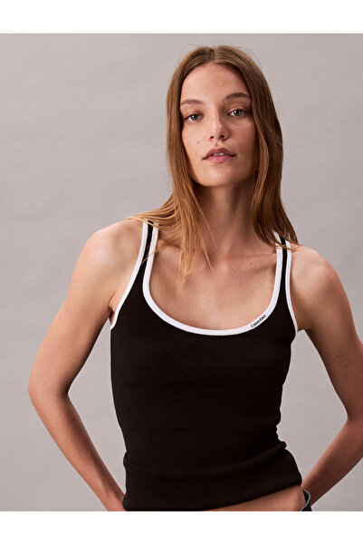 Calvin Klein بلوزة نسائية بدون أكمام من القطن الأسود المضلع من كالفن كلاين