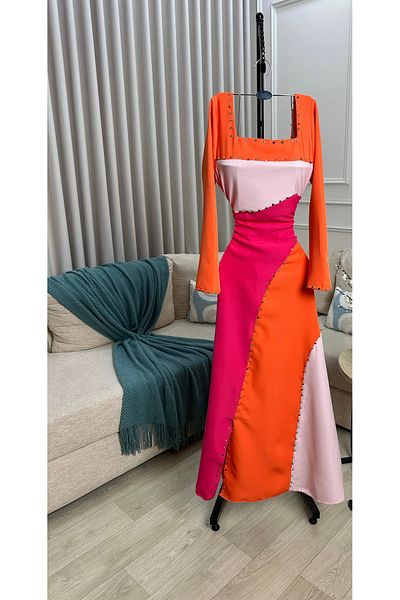 Diva style A distinctive and elegant dress with bright and vivid colors and beaded embroidery.