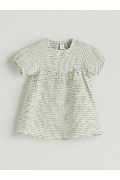 LC Waikiki RMZ GİYİM فستان بناتي مطرز بنمط مربعات وياقة روبا من FARKIYA