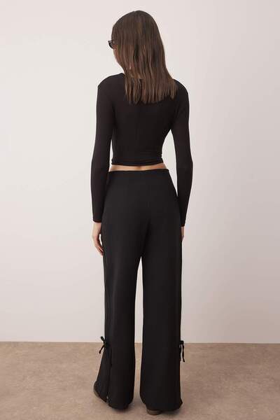 Trendyol Collection Black Wide Leg Pants with Slit and Bow Detail Twoaw26Pl00052