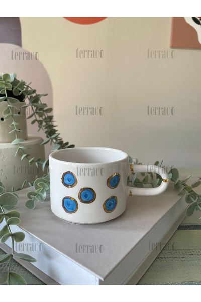 terraco ceramic Handmade Ceramic Mug with Two-Way Evil Eye Pattern and Gold Detail