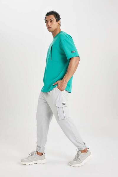 DeFacto Fitness Sportsman Jogger Sweatpants - Six Standard Fit Cargo, Υφαντό με τσέπες και Μέση στο πόδι, Ελαστικό C0043ax24