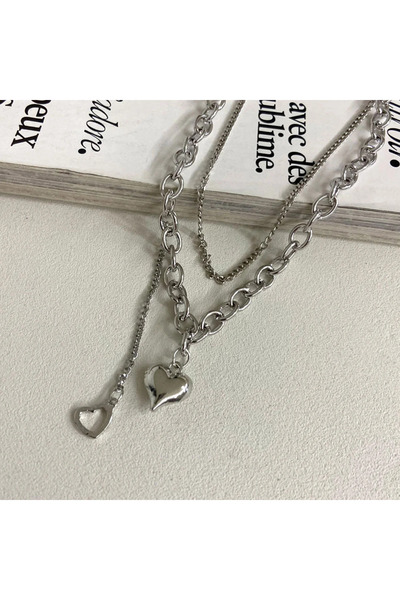 STAİNLES قلادة فضية على شكل قلبين