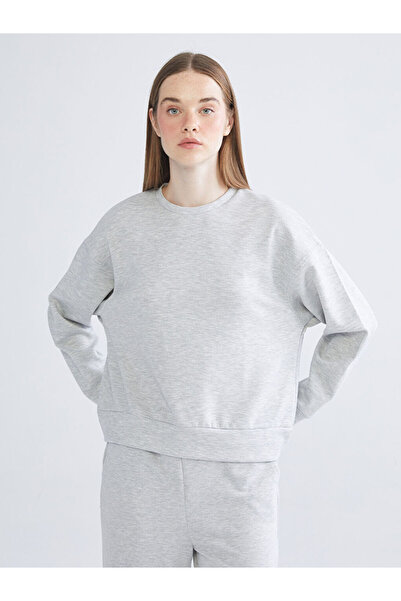 LC Waikiki خيارات أنيقة من إسفاب للملابس |   سويت شيرت نسائي كبير الحجم برقبة...