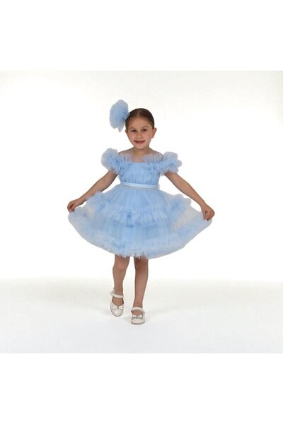 KidsMagazin Elegant blue dress with pompom