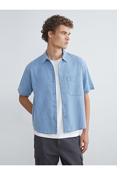 LC Waikiki قميص جينز رجالي بأكمام قصيرة وقصة عادية من إنديجو