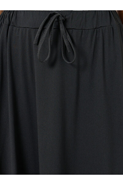 Styli Solid A-Line Maxi Skirt with Side Slit