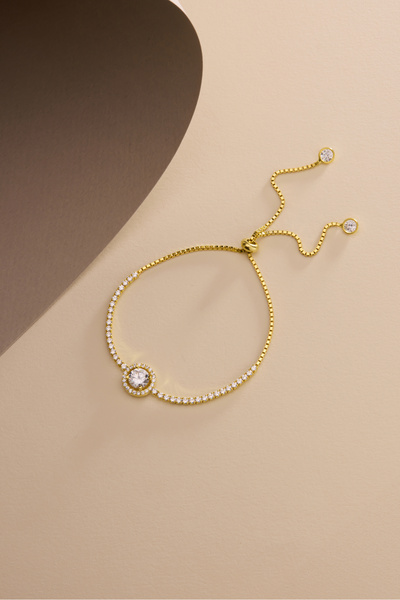 Nereze 925 Ayar Gümüş Gold Kaplama Ayarlanabilir Asansörlü Su Yolu 7 mm Yuvarlak Tektaş Model Bileklik