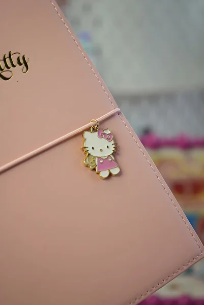 Victoria's Journals Hello Kitty Vegan Leather Daily 13X18 cm Lined Notebook with Elastic – Charm Ornament Detail