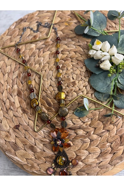 SEDEF TAKI Antik işlemeli uzun çiçek kolye