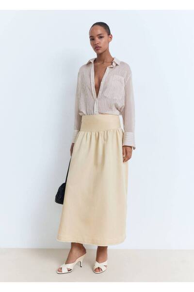 MANGO Woman Püsküllü midi etek uçları