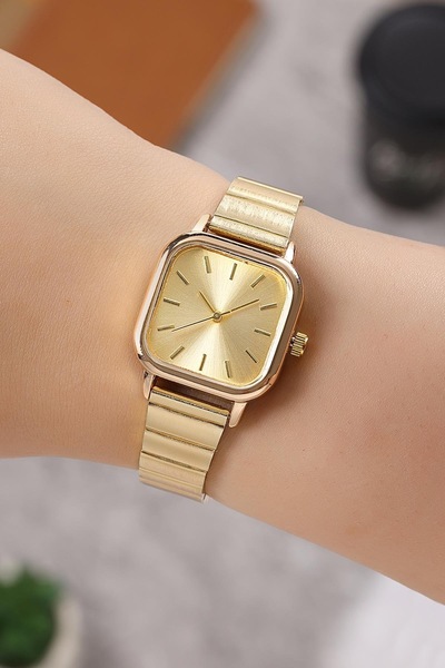 Louis Genessio الرجعية الحد الأدنى البيضاوي IPC مطلي الذهب ساعة اليد النسائية