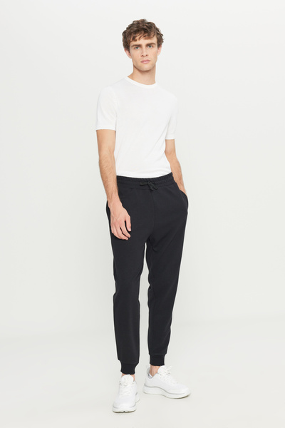 AC&Co / Altınyıldız Classics Men's Black Cotton Standard Fit Tie Waist Patterned Side Pocket Sweatpants