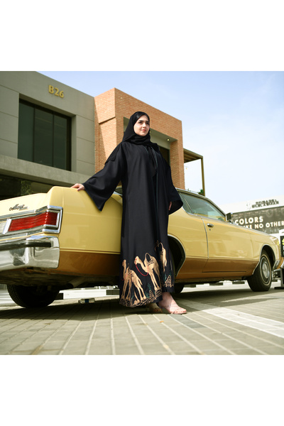 HAWRAA Black wrap abaya for national occasions, with a green silk lining and embroidered at the bottom