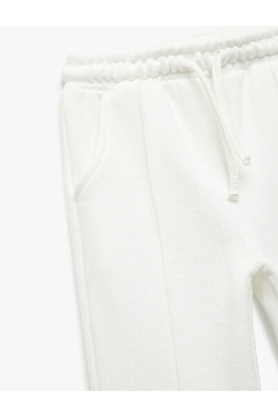 Koton Carrot Cut Basic Trousers with Elastic Waist and Pockets