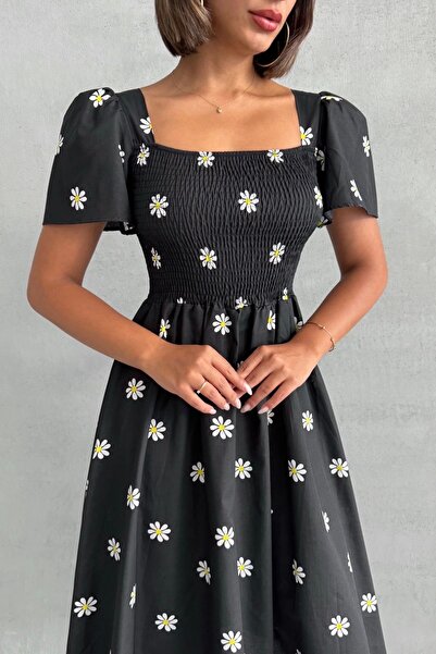 URİS Γυναικείο φόρεμα μίντι μαύρο με μοτίβο Daisy