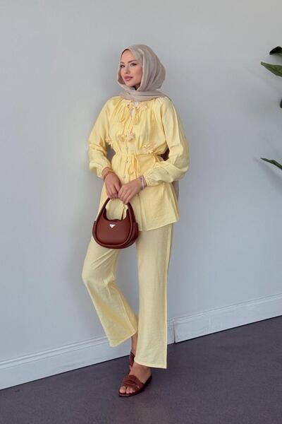 Şulemoda Giyim طقم فراولة بتفاصيل جيبور باللون الأصفر