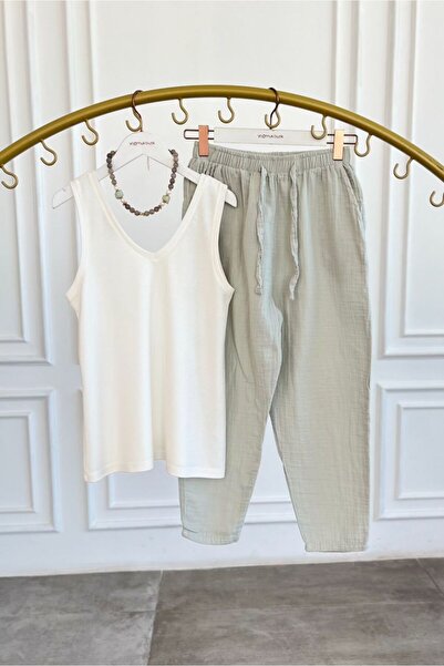 Yağmur Butik Панталони от муслин в цвят морков